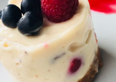 white chocolate and winter berry cheesecake